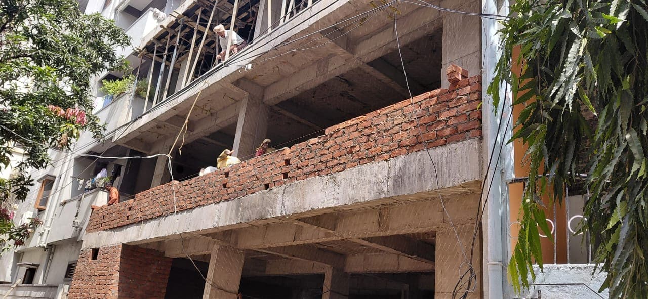 Red brick parapet under construction